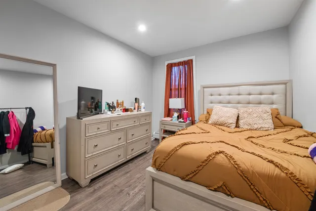 a bedroom with a bed and a closet