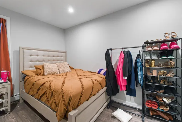 a bedroom with a bed and a closet