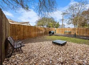 a garden view with a seating space