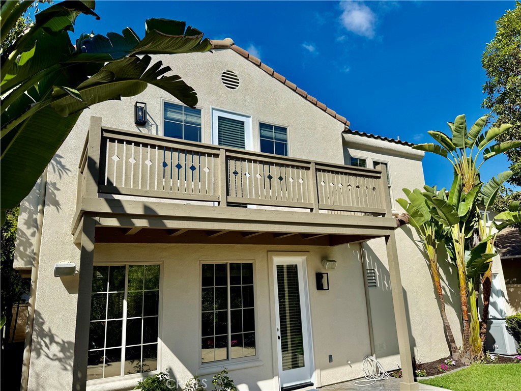 2 Via Destino San Clemente, CA 92673 - Photo 14 of 14 a view of a white house with large windows and a small yard