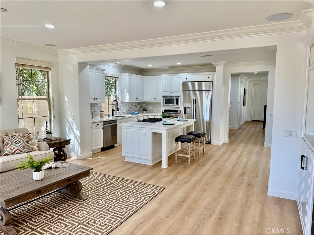 2 Via Destino San Clemente, CA 92673 - Photo 3 of 14 a living room with granite countertop furniture a rug kitchen view and a window