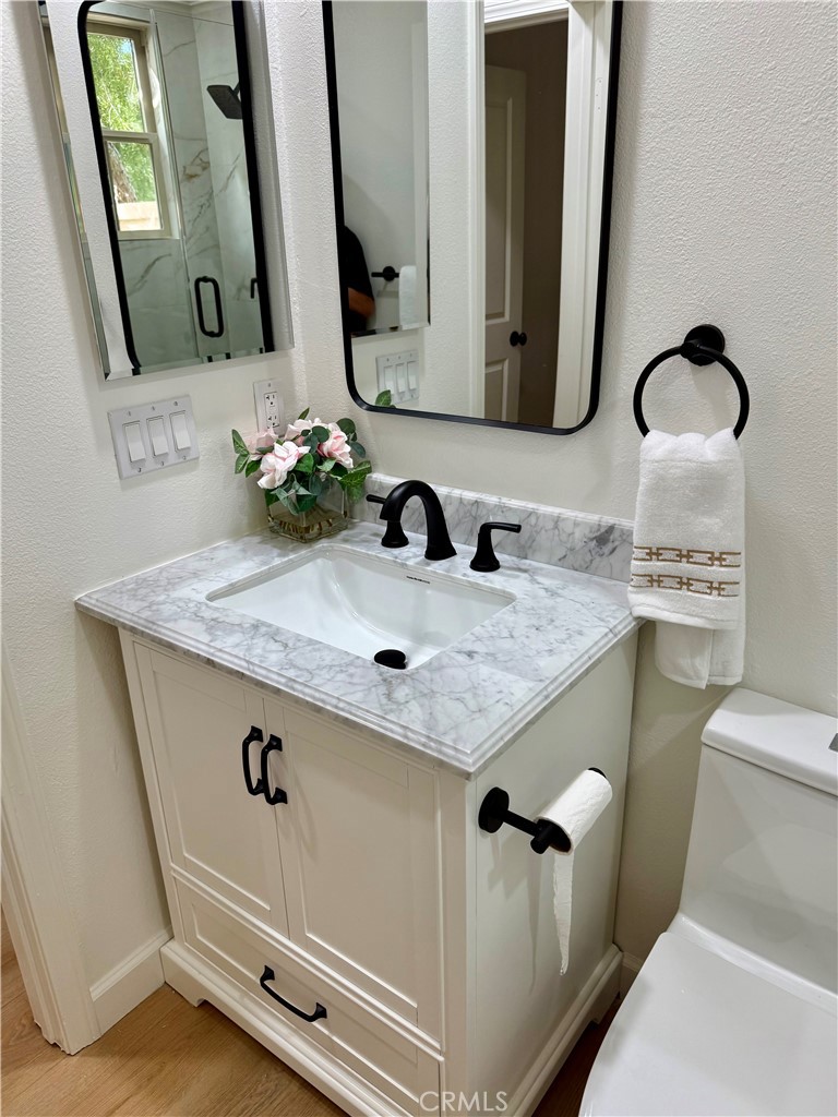 2 Via Destino San Clemente, CA 92673 - Photo 8 of 14 a bathroom with a sink and a mirror