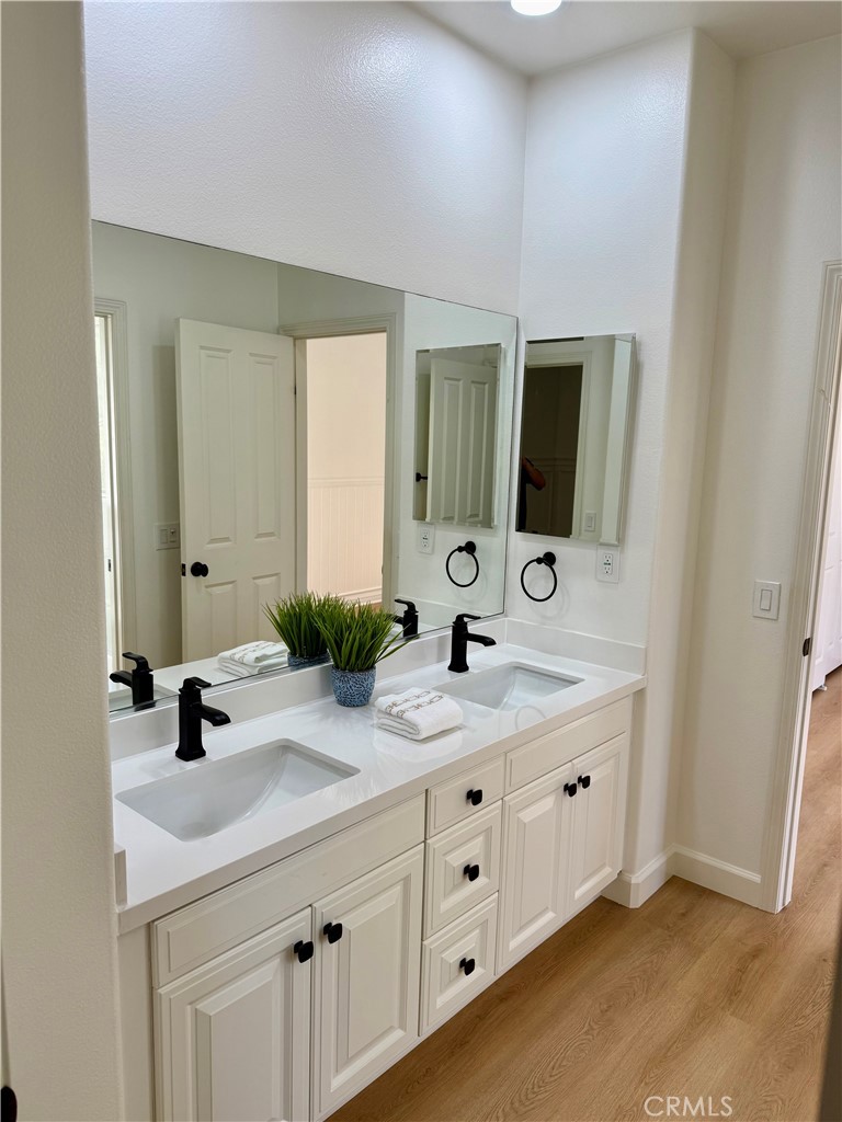 2 Via Destino San Clemente, CA 92673 - Photo 10 of 14 a bathroom with double sink and a mirror