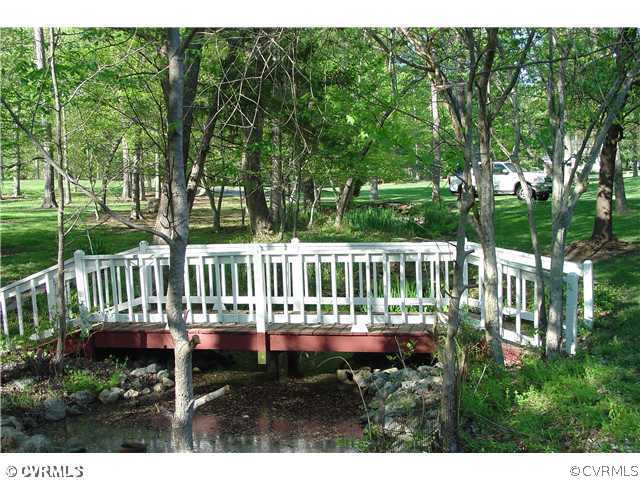 14311 Sylvan Ridge Road Chesterfield, VA 23838 - Photo 6 of 11 Yard/Garden - Beautiful bridge in front yard over