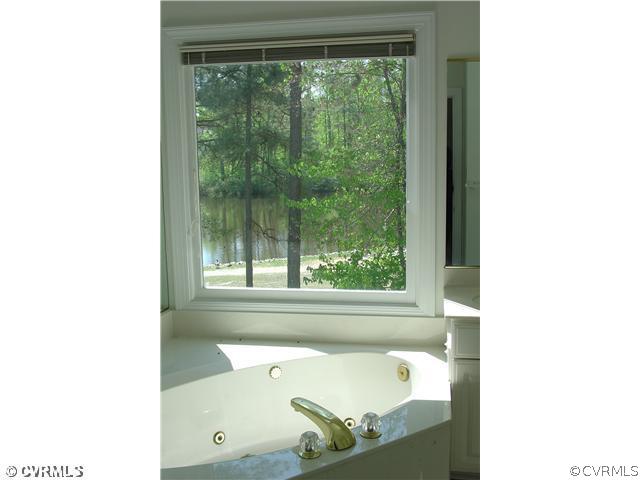 14311 Sylvan Ridge Road Chesterfield, VA 23838 - Photo 8 of 11 Master Bath/Spa - Master Bath spa tub overlooks th