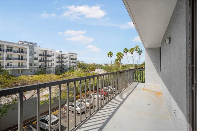 a view of a chairs and table in a patio