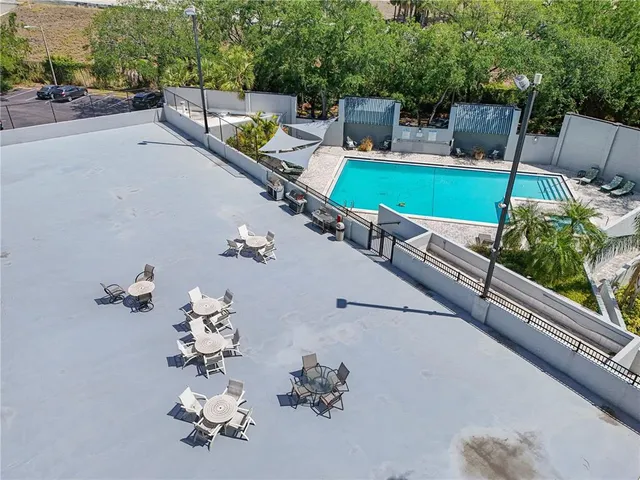 a view of a lake with a city skyline in the background