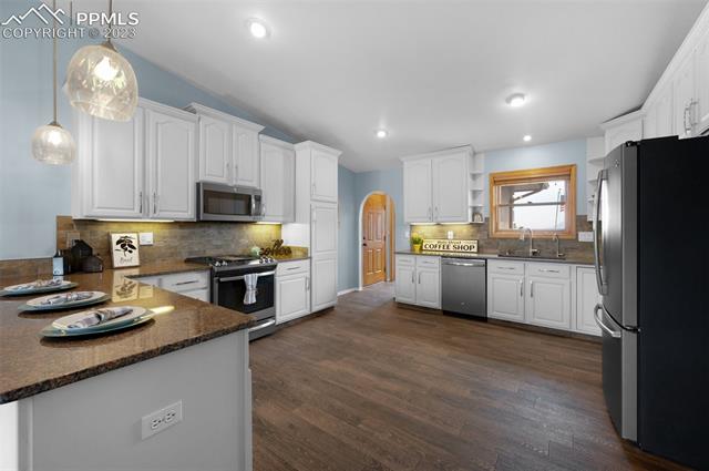 1270 Montezuma Road Colorado Springs, CO 80920 - Photo 4 of 42 Kitchen with granite countertops.
