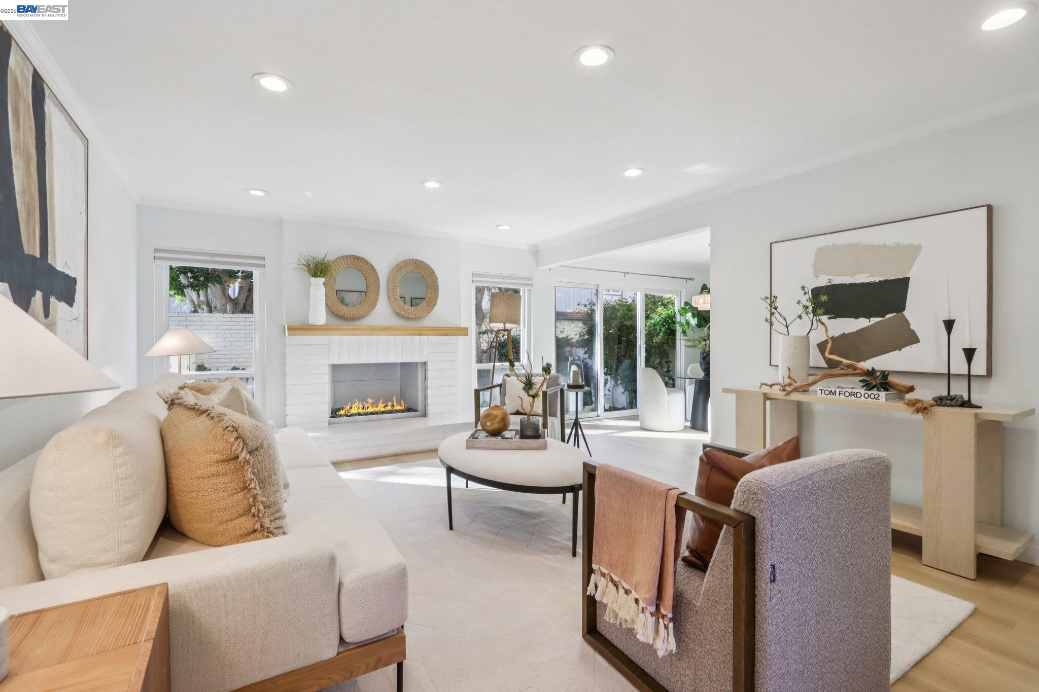 3416 Manchester Common Fremont, CA 94536 - Photo 1 of 1 a living room with furniture and a fireplace