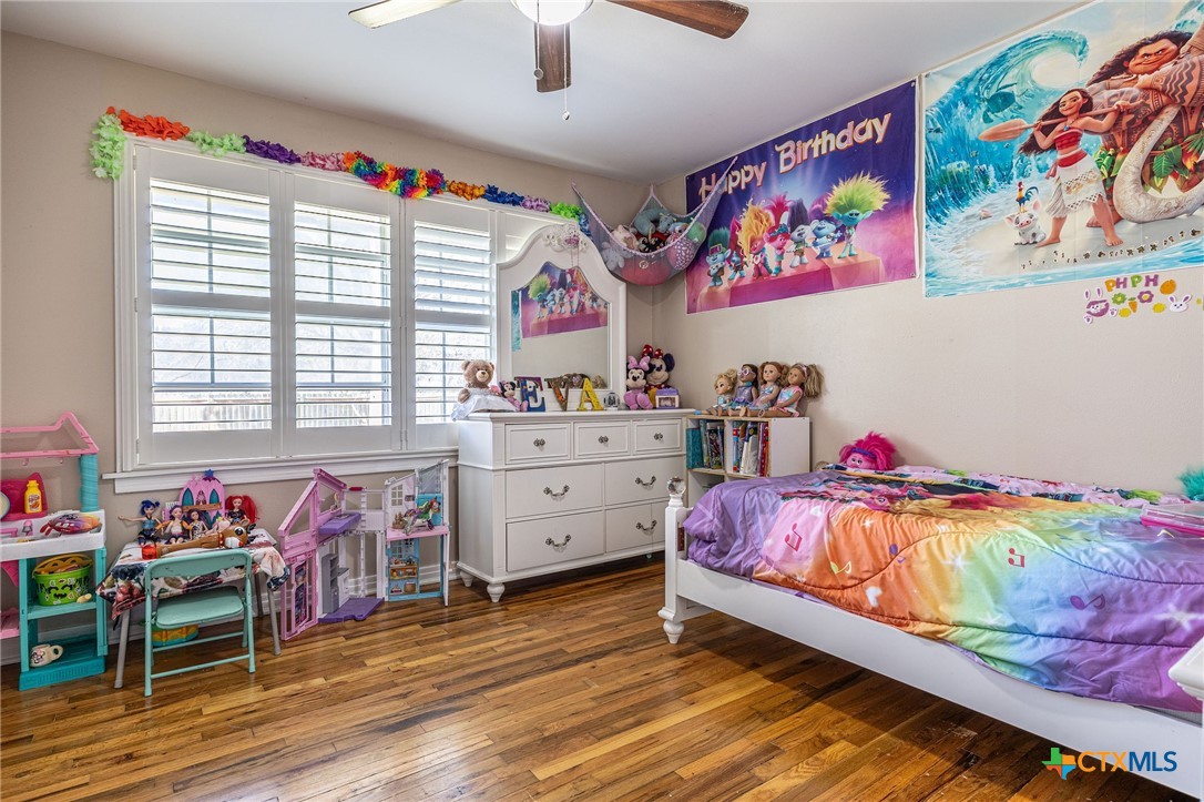 743 Royal Road Port Lavaca, TX 77979 - Photo 9 of 21 a bedroom with a bed and a dresser in it