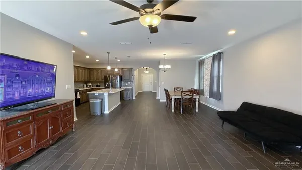 a view of kitchen with sink microwave and stove