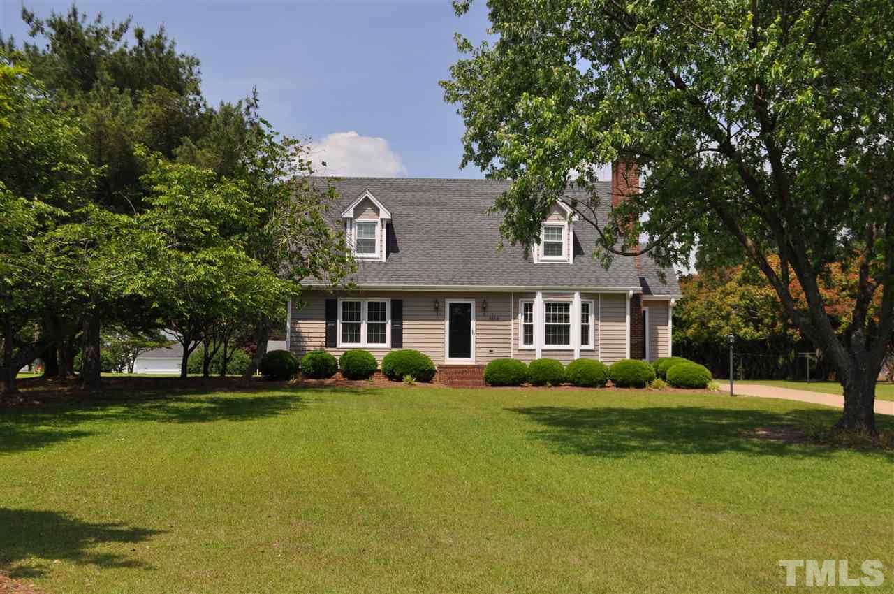 5616 Cleveland Road Clayton, NC 27520 - Photo 2 of 21 Almost an acre (.99 ac) lot with house nestled in the trees.