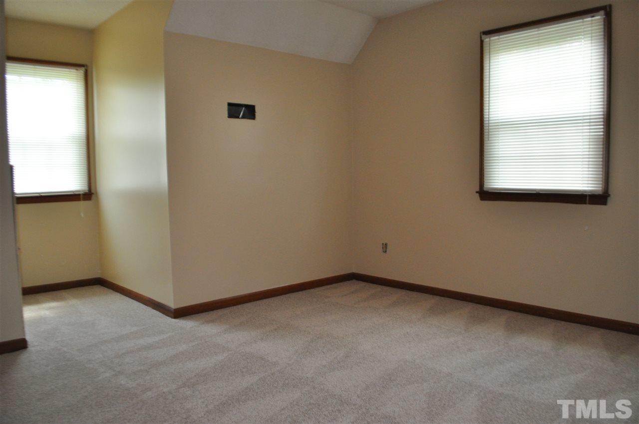 5616 Cleveland Road Clayton, NC 27520 - Photo 15 of 21 Bedroom number 2 with dormer window and lots of natural light.