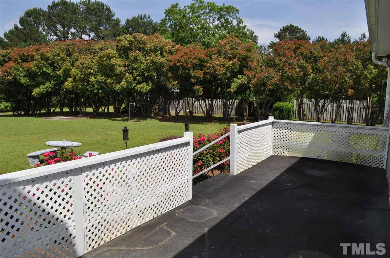 5616 Cleveland Road Clayton, NC 27520 - Photo 17 of 21 Large patio is great for summer BBQs (carpet is removable)
