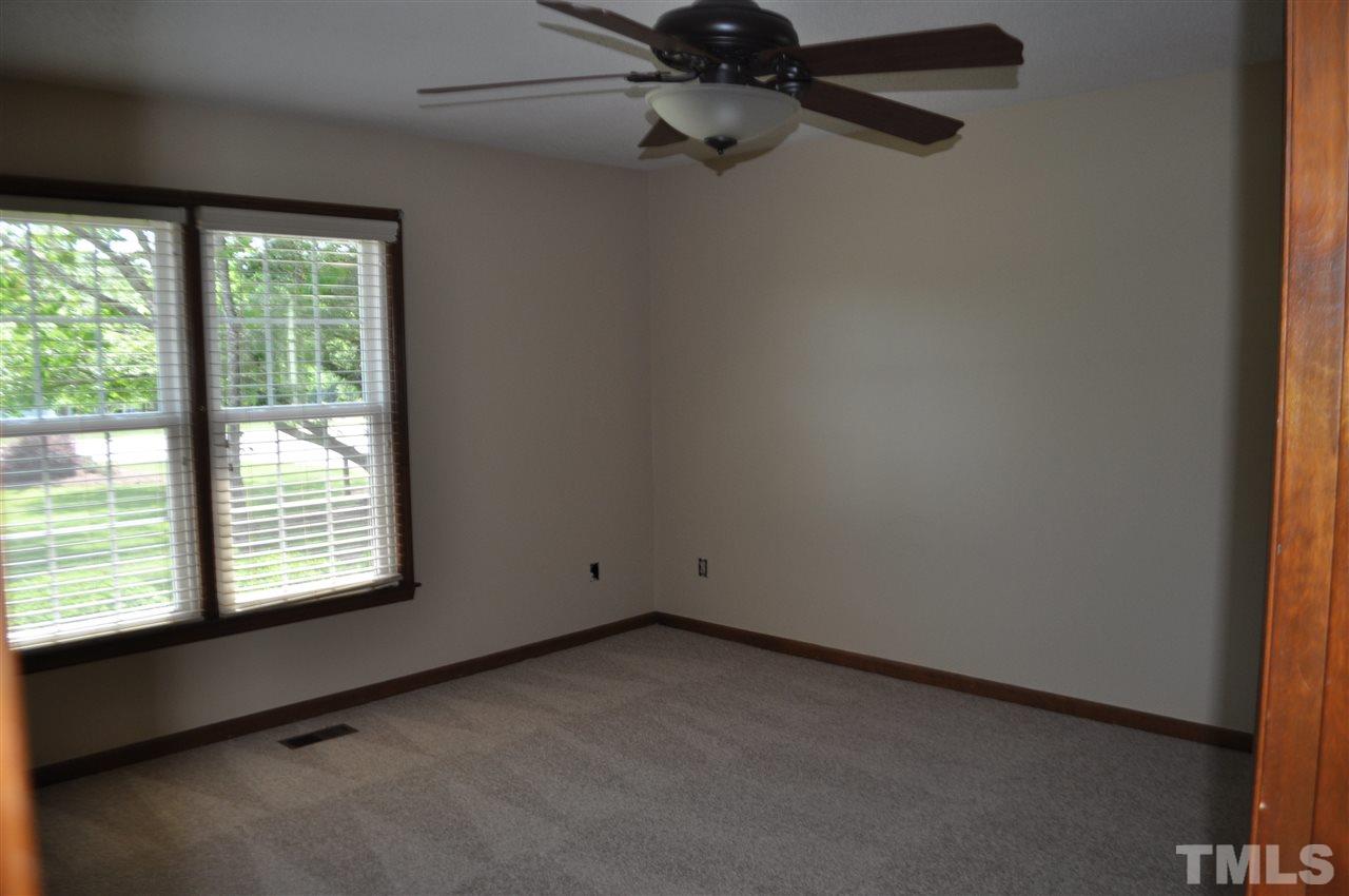 5616 Cleveland Road Clayton, NC 27520 - Photo 9 of 21 Large downstairs bedroom makes a great master retreat.