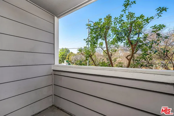 a view of a balcony from a window