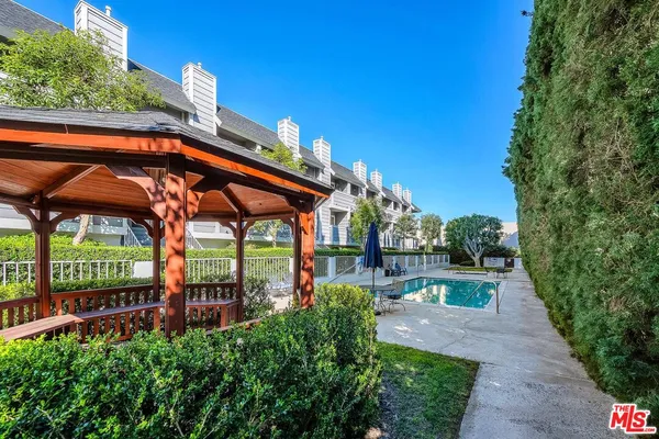 a view of yard with patio