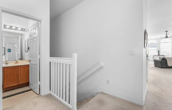 a kitchen with stainless steel appliances granite countertop a stove and a refrigerator