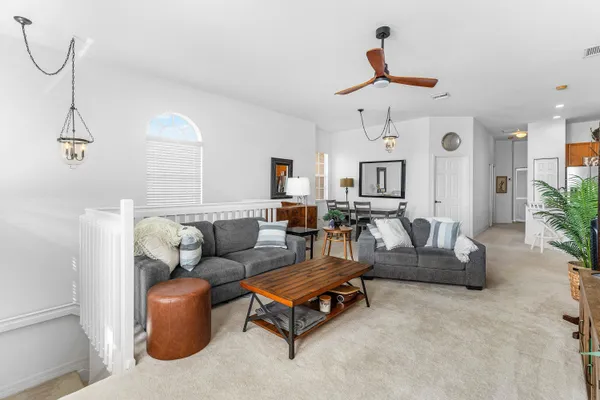 a view of balcony with furniture