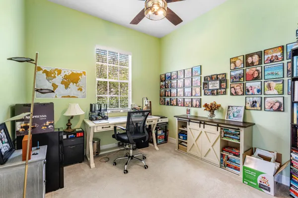 an aerial view of residential houses with outdoor space and street view