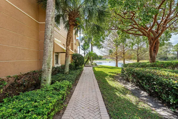 a view of a pathway with a yard