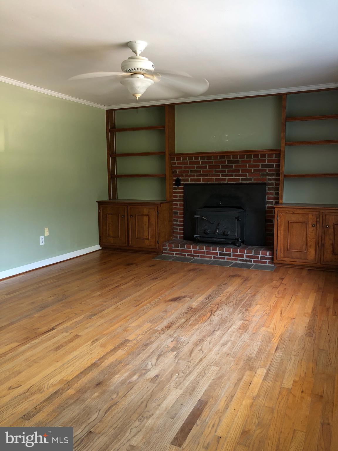 8497 Ingleton Road Easton, MD 21601 - Photo 3 of 29 Living Room with Wood Stove