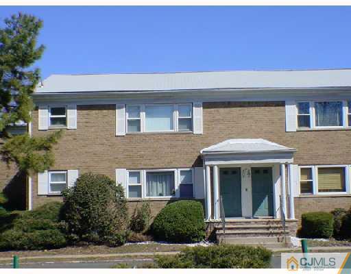 32 Judson Street, Unit 10A Edison, NJ 08837 - Photo 1 of 1 a front view of a house with a yard