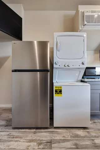 a utility room with washer and dryer