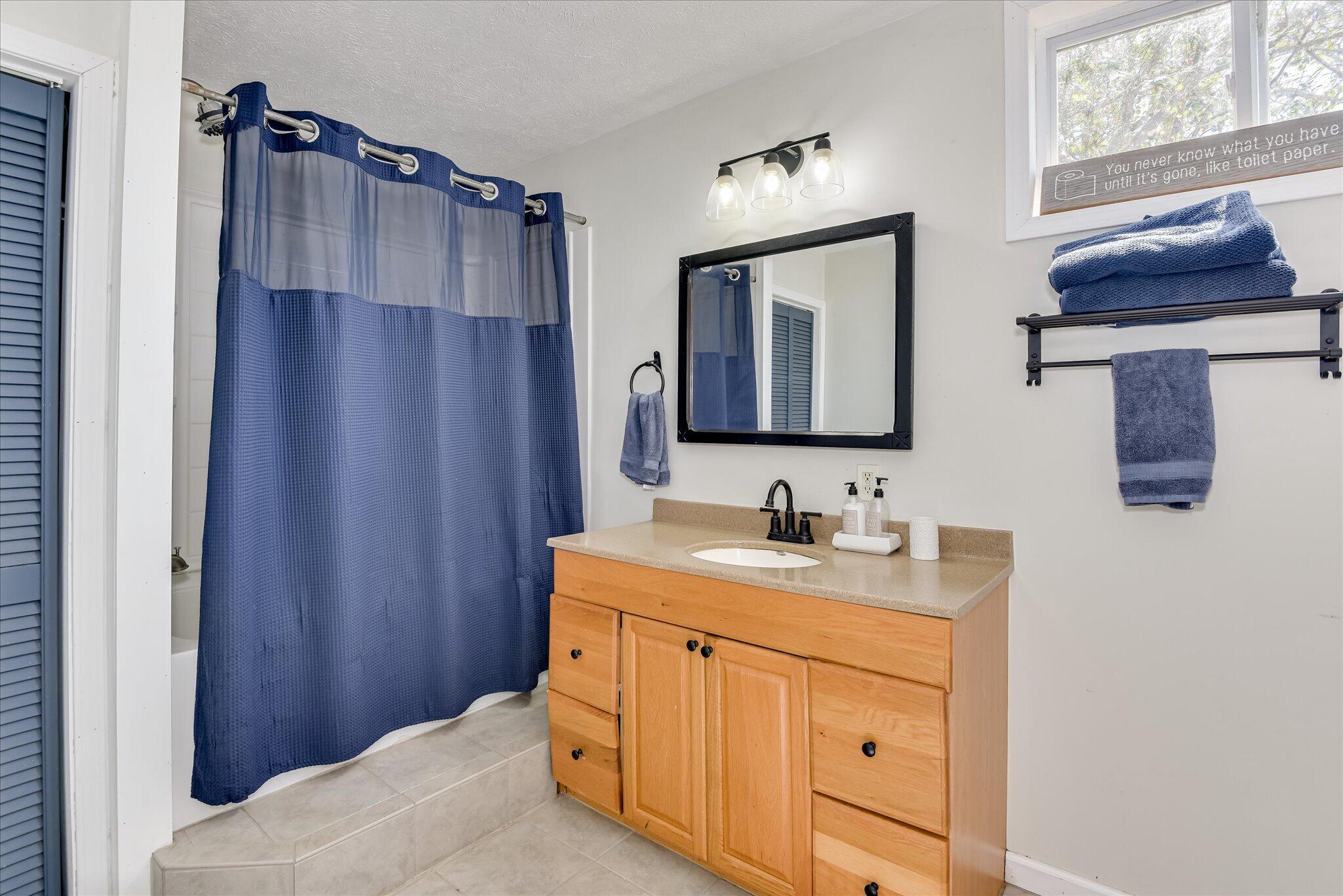 1063 Colbert Bridge Road Aiken, SC 29803 - Photo 44 of 68 a bathroom with a sink and a mirror