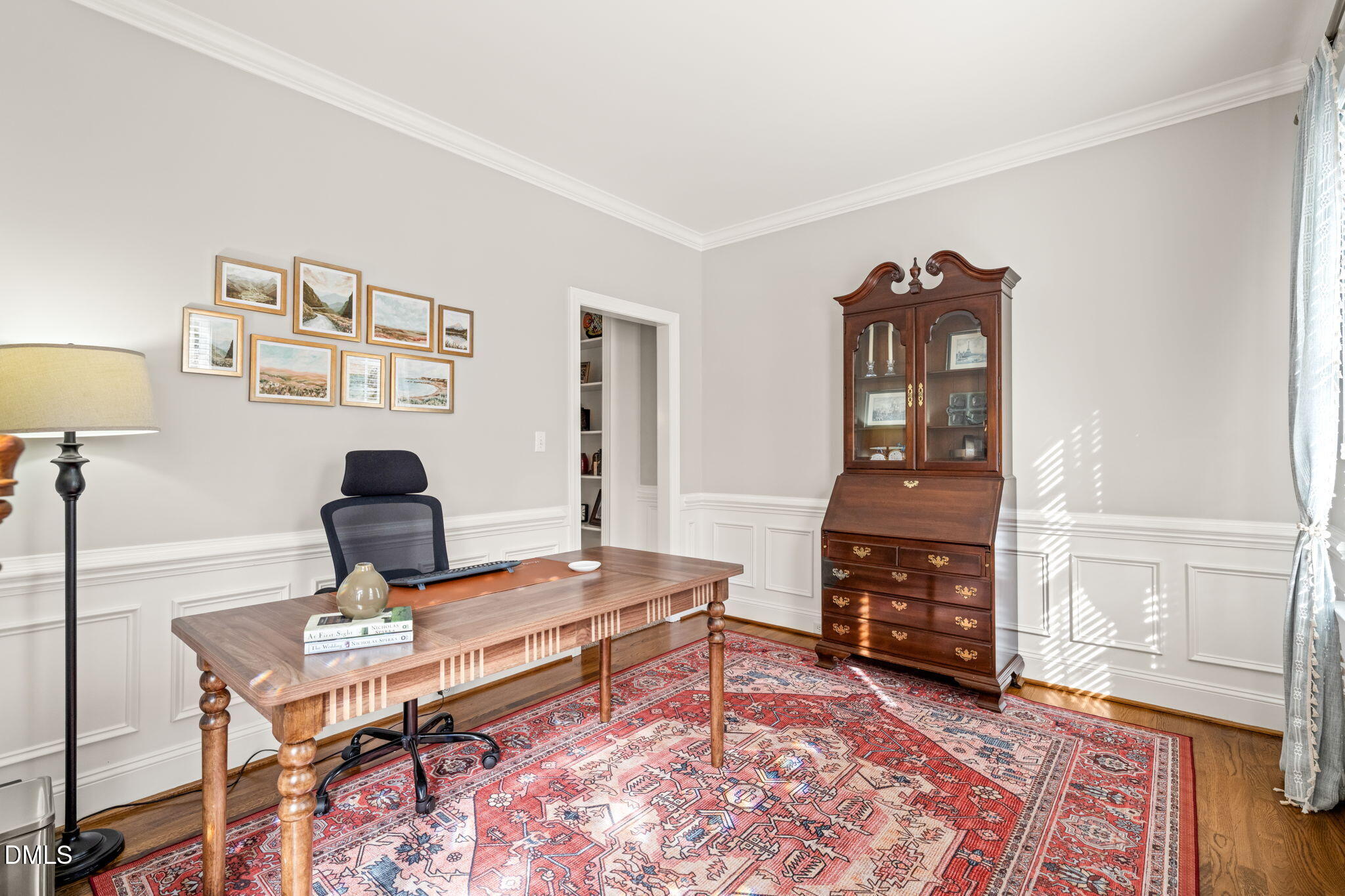 5504 Orchid Hill Drive Raleigh, NC 27613 - Photo 15 of 46 a living room with furniture and a wooden floor