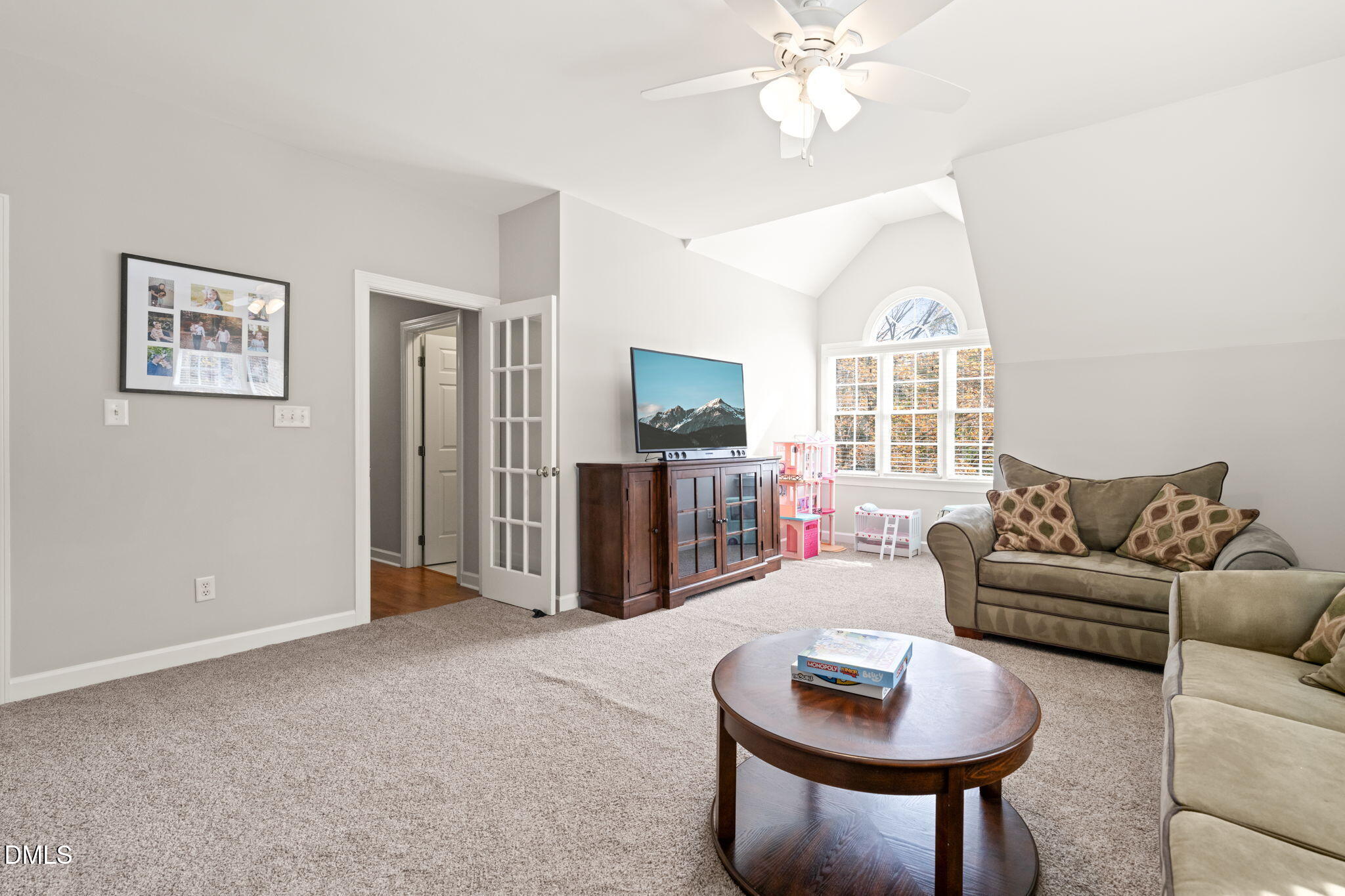 5504 Orchid Hill Drive Raleigh, NC 27613 - Photo 29 of 46 a living room with furniture and a window