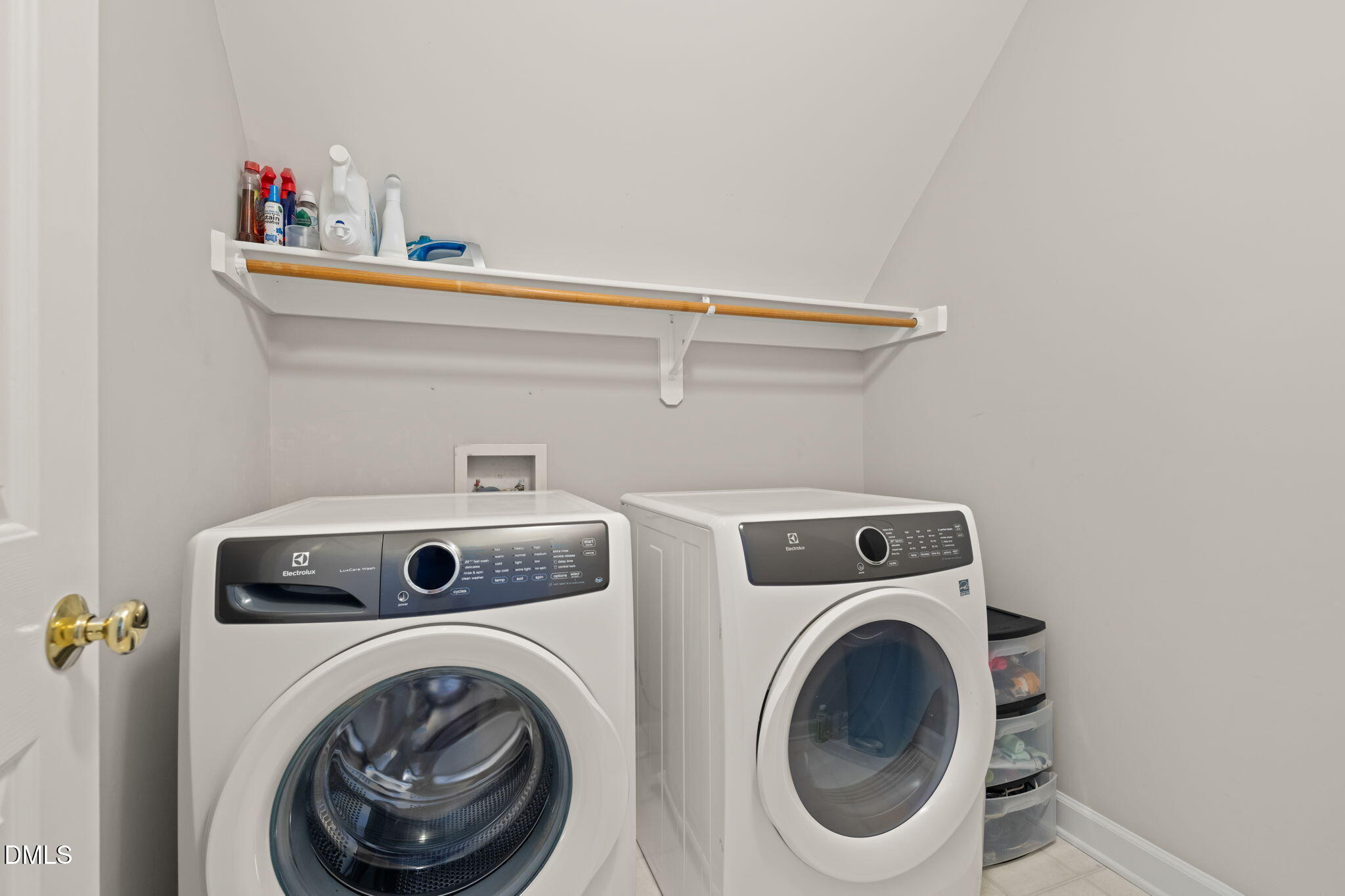 5504 Orchid Hill Drive Raleigh, NC 27613 - Photo 32 of 46 a utility room with dryer and washer