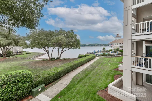 a view of a garden with a house