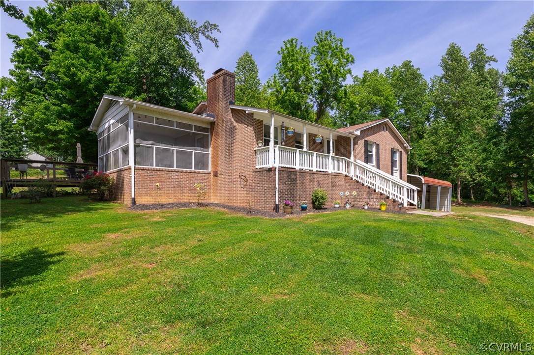 6039 Old Nottoway Road Crewe, VA 23930 - Photo 2 of 46 a front view of a house with a yard and trees