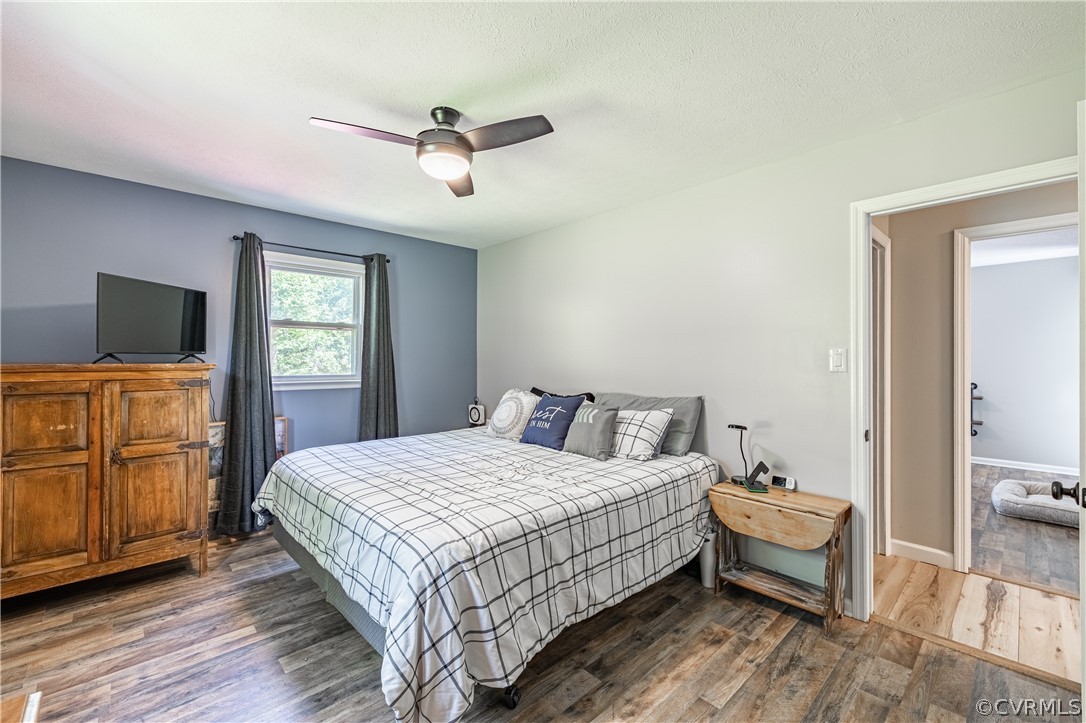 6039 Old Nottoway Road Crewe, VA 23930 - Photo 24 of 46 a bedroom with a bed and wooden floor