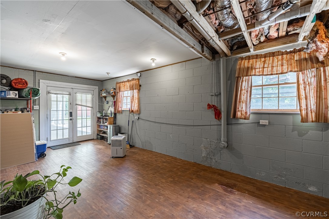 6039 Old Nottoway Road Crewe, VA 23930 - Photo 29 of 46 an empty room with wooden floor and windows