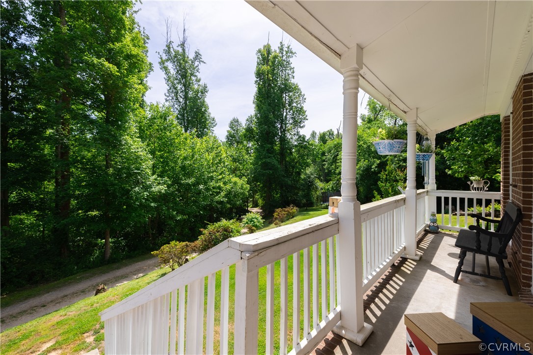 6039 Old Nottoway Road Crewe, VA 23930 - Photo 36 of 46 a view of balcony with deck and wooden floor
