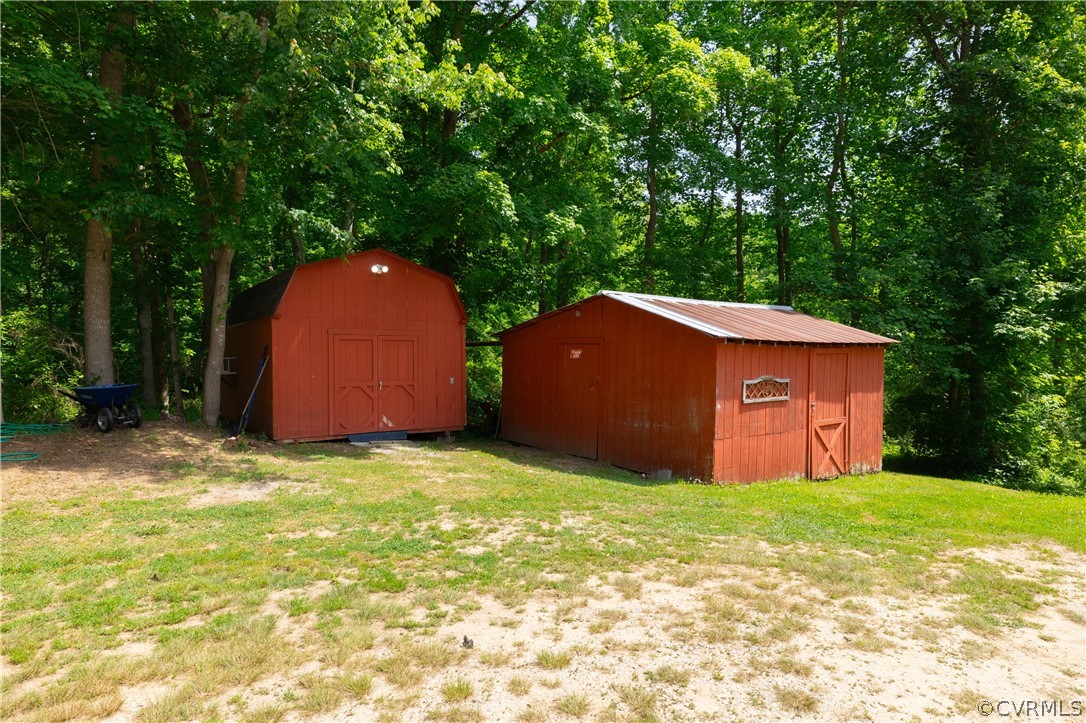6039 Old Nottoway Road Crewe, VA 23930 - Photo 44 of 46 a view of a backyard with a garden and entertaining space