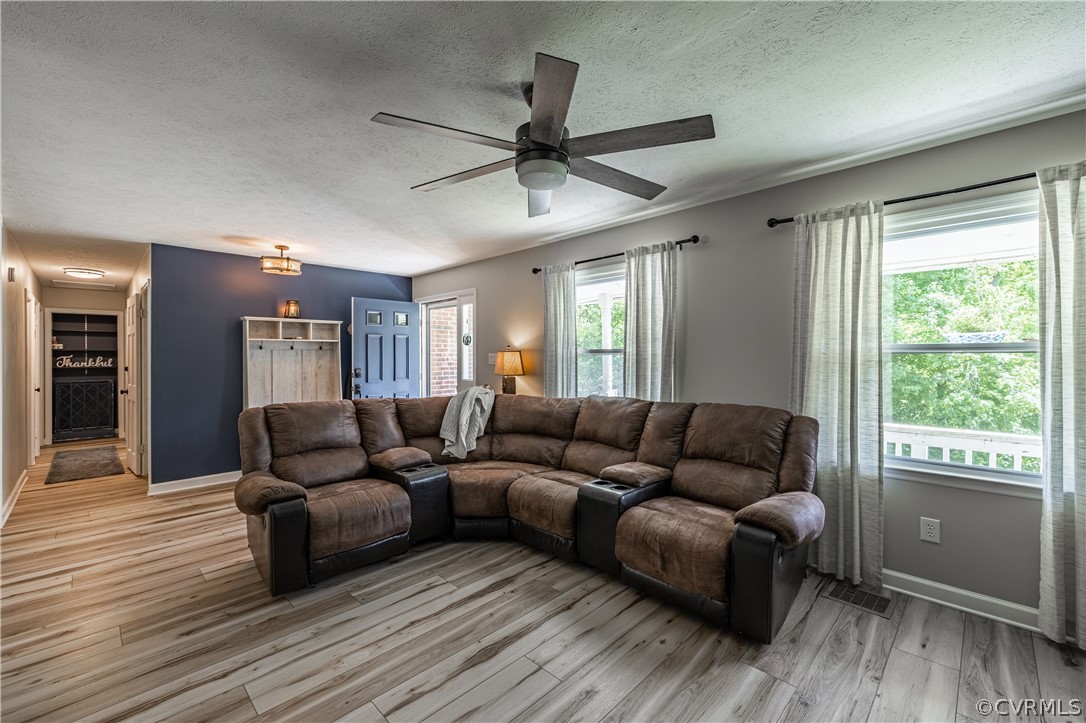 6039 Old Nottoway Road Crewe, VA 23930 - Photo 6 of 46 a living room with furniture and a wooden floor