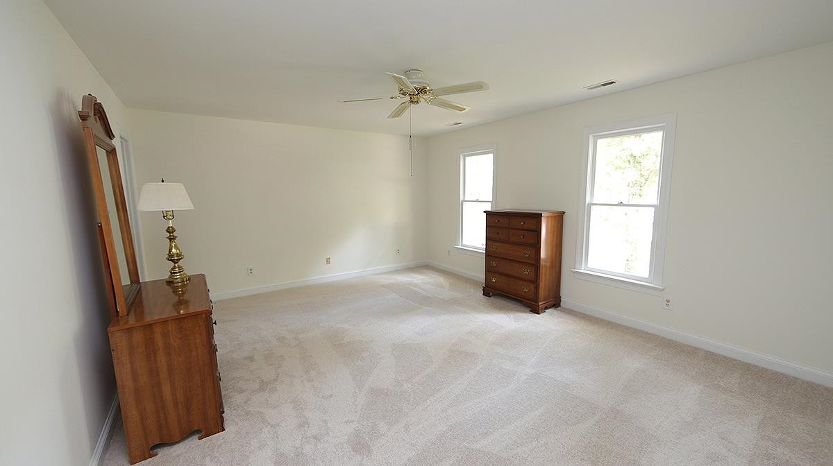 8700 Mourning Dove Road Raleigh, NC 27615 - Photo 19 of 30 All brand new carpet upstairs as well as paint and smooth ceilings throughout! Nice size walk in closet here. Master Bedroom