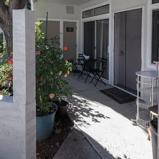 a view of a backyard of the house