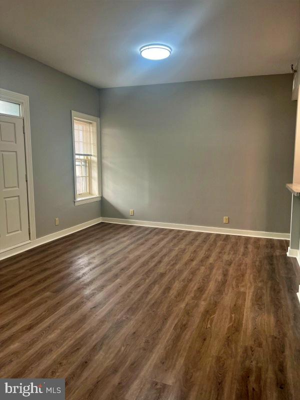 11 North Beaver Street, Unit 304 York, PA 17401 - Photo 8 of 10 wooden floor in an empty room with a window