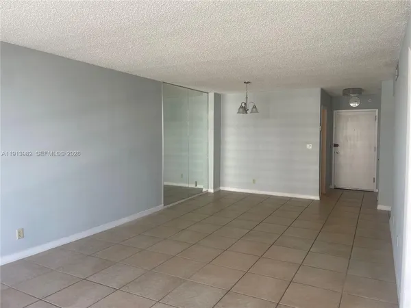 a view of a room with a large window