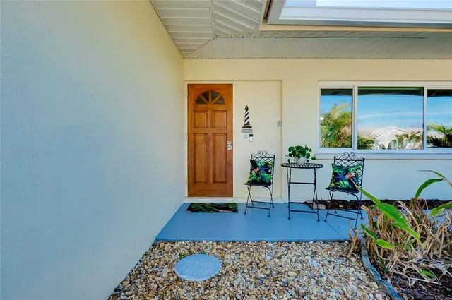 an aerial view of a house with a garden