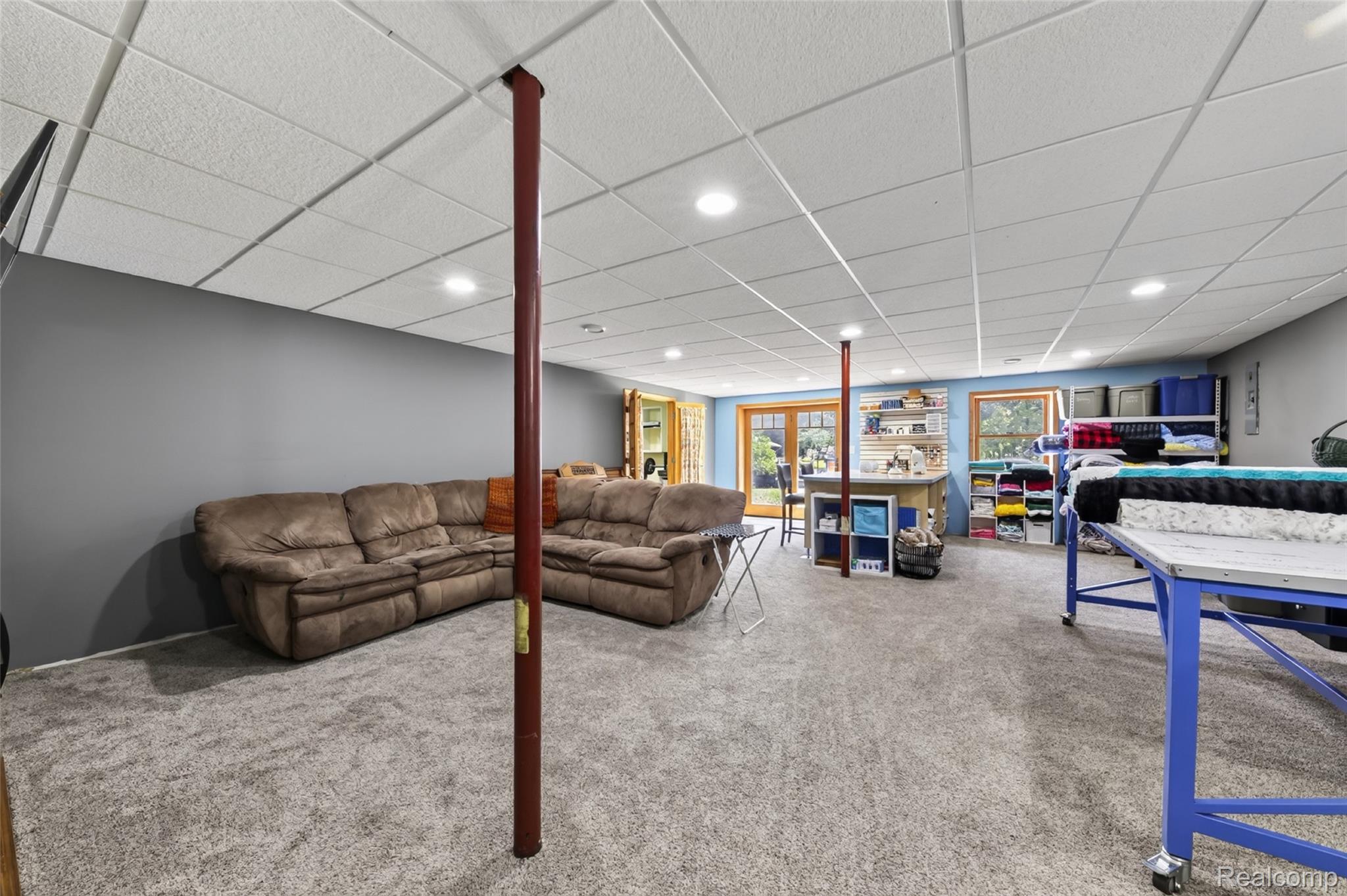 7447 Ore Lake Road Brighton, MI 48116 - Photo 35 of 45 Spacious room with light gray carpeting and a dropped ceiling with recessed lighting