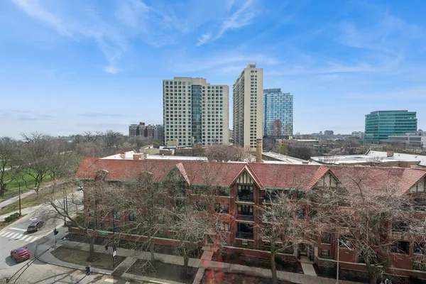a view of a city with tall buildings