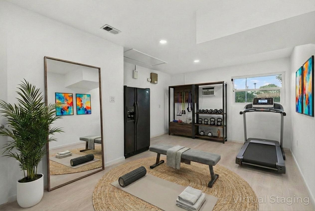 699 Northwest 16th Avenue Boca Raton, FL 33486 - Photo 29 of 39 a living room with furniture and a flat screen tv