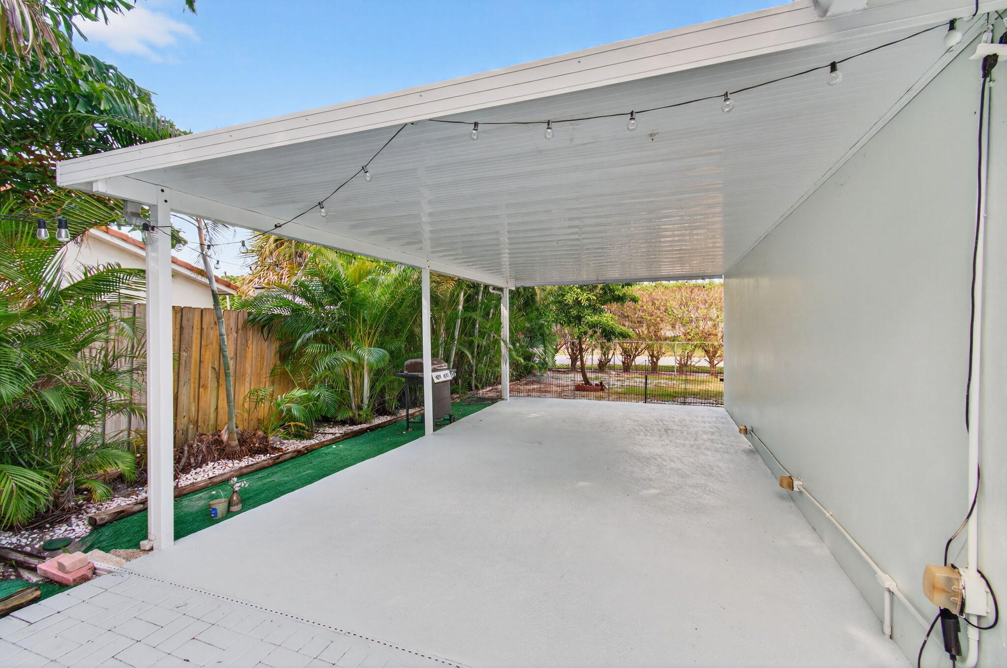 699 Northwest 16th Avenue Boca Raton, FL 33486 - Photo 29 of 32 a house view with a garden space