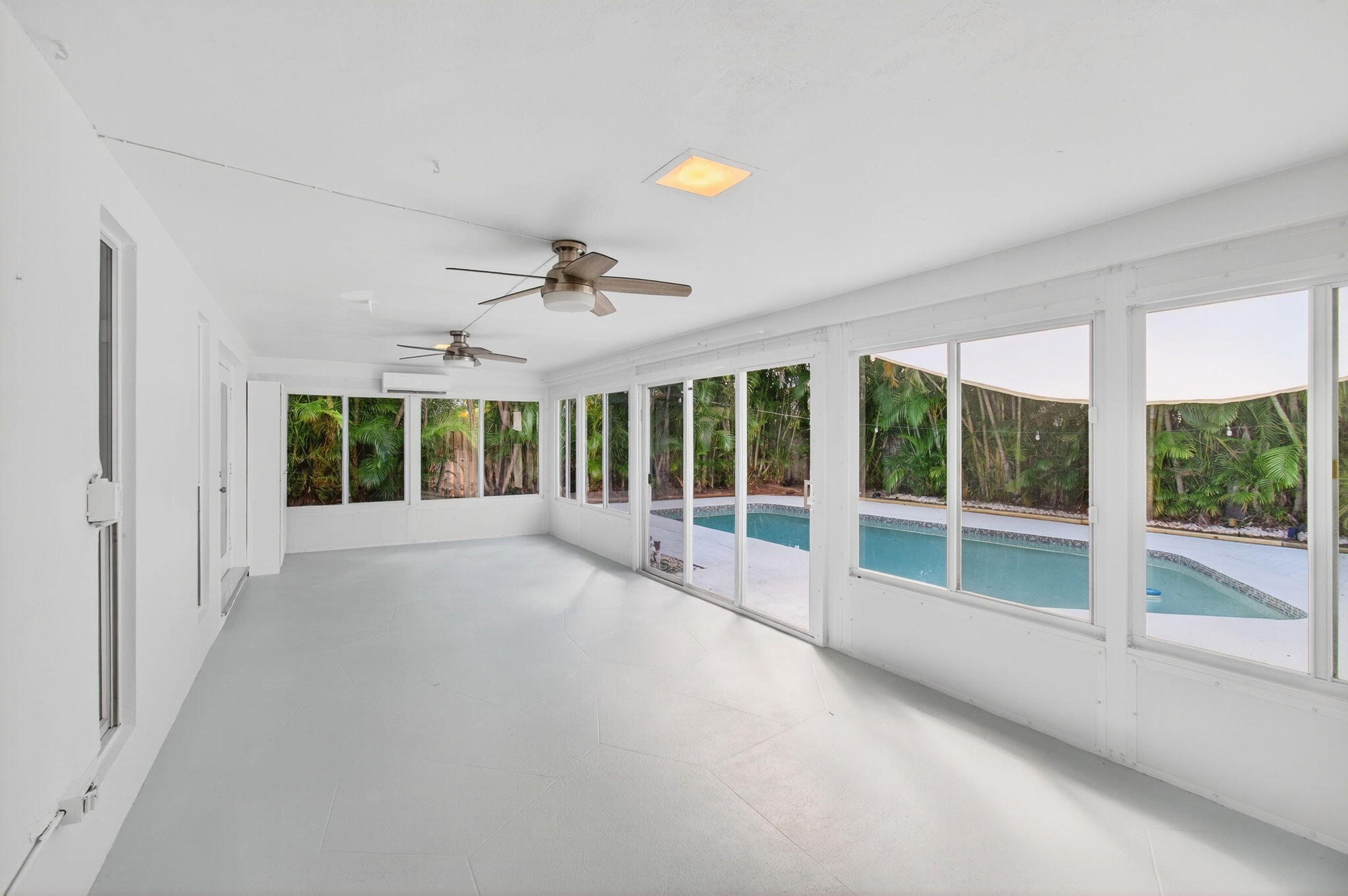 699 Northwest 16th Avenue Boca Raton, FL 33486 - Photo 30 of 39 a view of an empty room with a balcony