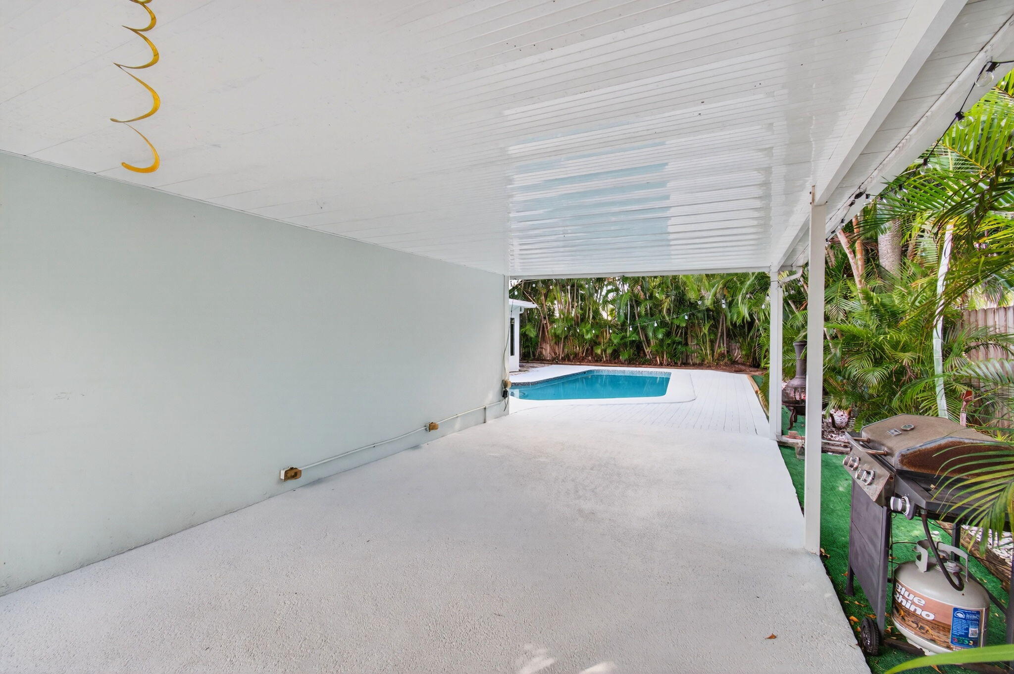 699 Northwest 16th Avenue Boca Raton, FL 33486 - Photo 40 of 46 a view of a backyard with plants and outdoor seating